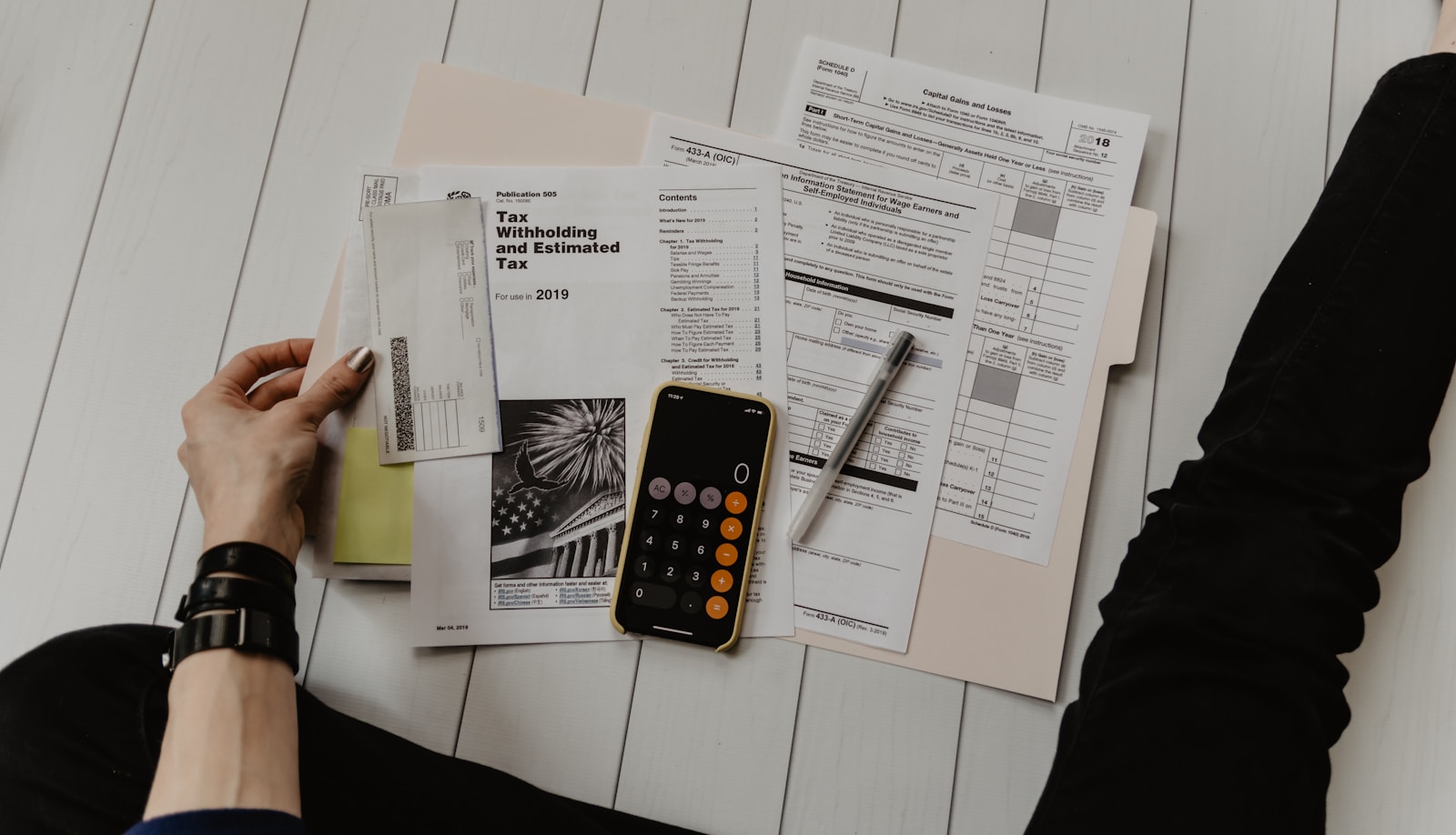 Financial planning documents and portfolio materials on a desk